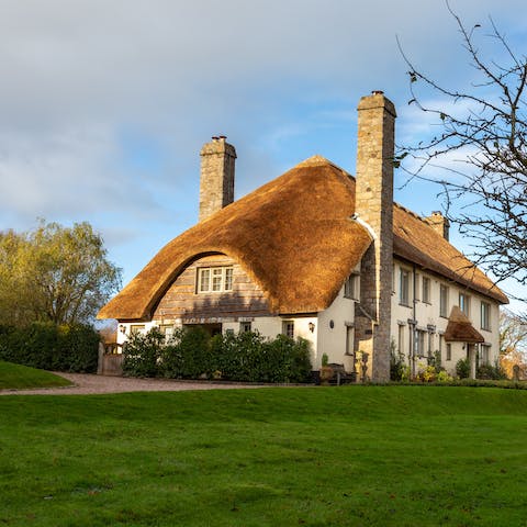 Bask in the fresh country air on the expansive lawn and admire the views over Teign Valley