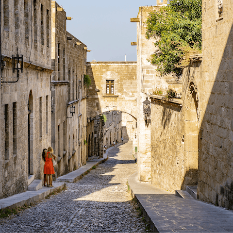 Walk down the cobbled path of the Street of Kings – a fourteen minute drive away