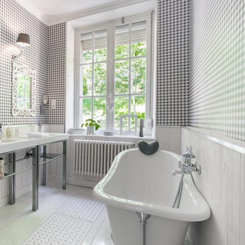 Finish the day with a restorative soak in the freestanding bathtub