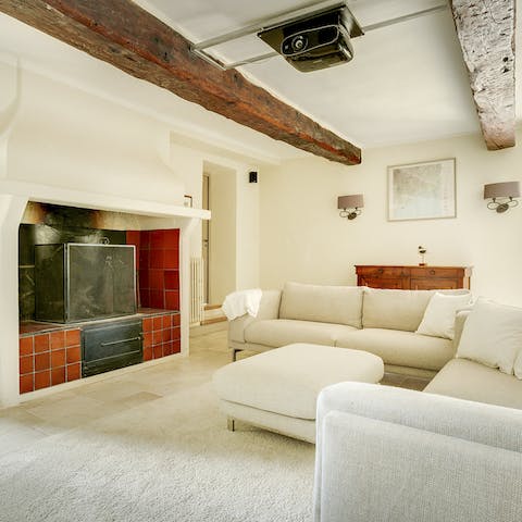 Relax with a French noir classic in the cinema room