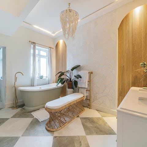 Relax in one of the opulent en-suite bathrooms