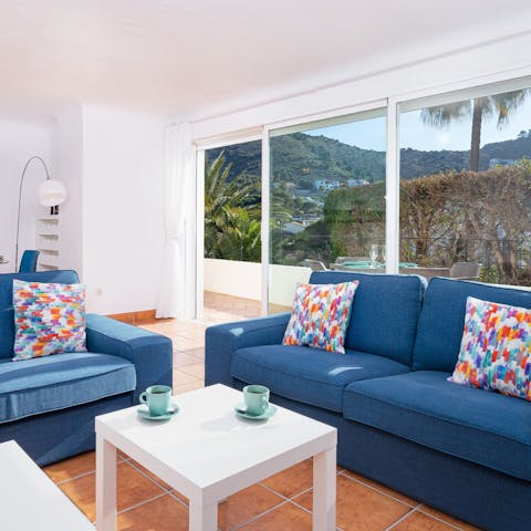 Let the sea breeze in with the glass sliding doors in the living room
