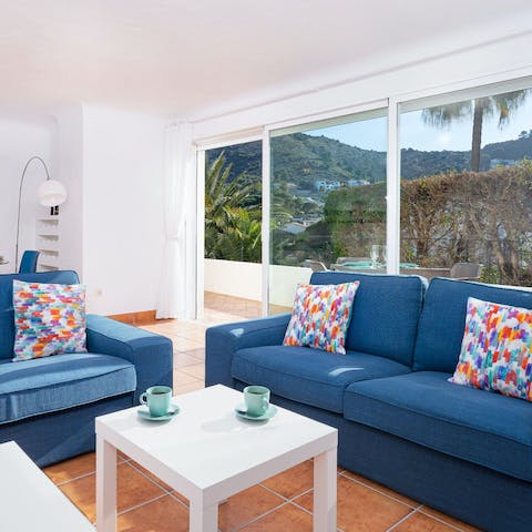 Let the sea breeze in with the glass sliding doors in the living room