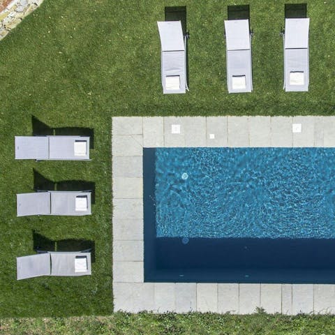 Swim and sunbathe under the Tuscan sun at the private pool