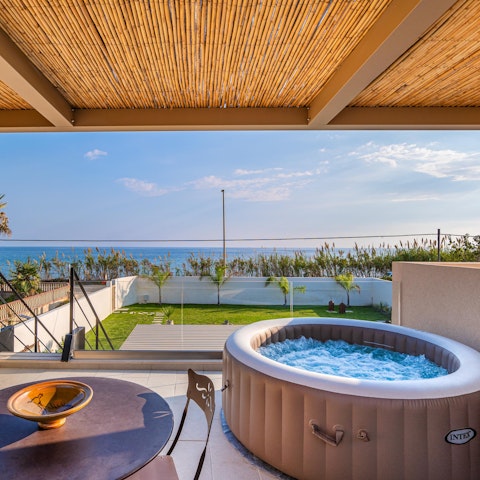 Admire sea views from the hot tub and the private pool