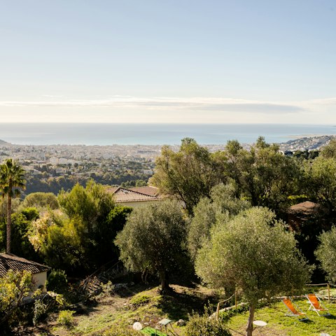 Spend peaceful days lounging in the garden with views across the sea