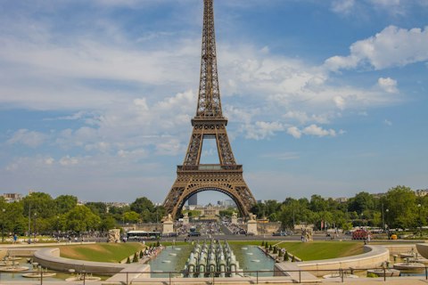 Marvel at the Eiffel Tower's iconic silhouette, a nine-minute walk