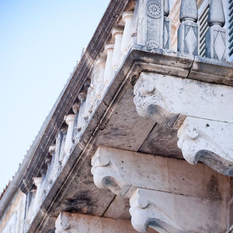 Admire the ornate details of your historic villa