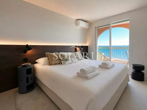 Wake to open sea views from a well-appointed bedroom