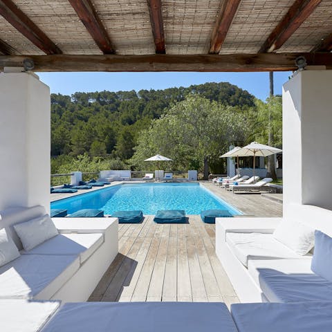 Get some shade from the Ibiza sun or cool off in the private pool