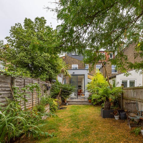 Soak up some sun in the leafy garden – there's a trampoline here too for little ones