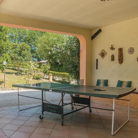 Play a few games of ping pong in the shade