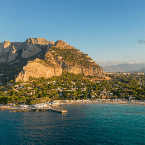 Walk along the Mondello beach at sunset