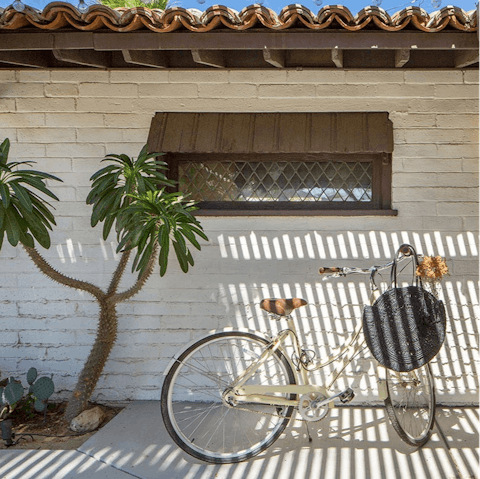 Pedal out on the bikes to visit shops and bring back some dinner