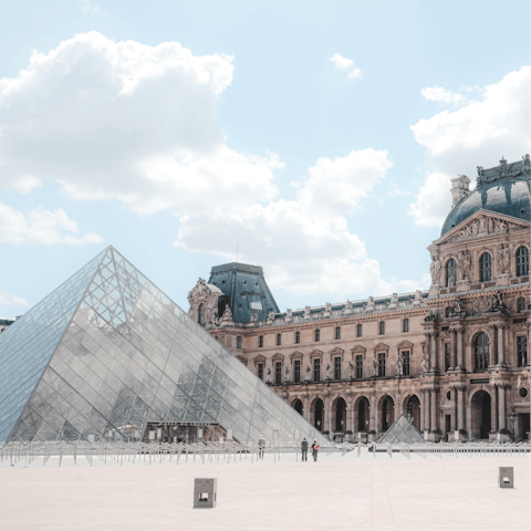 Walk a few minutes along the Seine to the Louvre