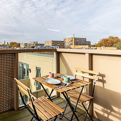 Enjoy breakfast and plan your day on the balcony