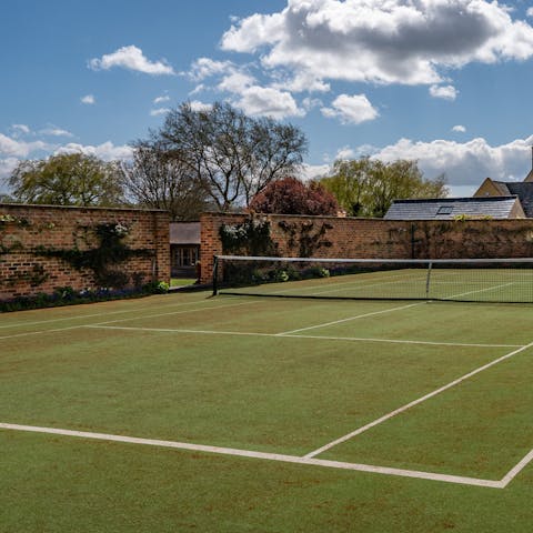 Enjoy a game on the private tennis court