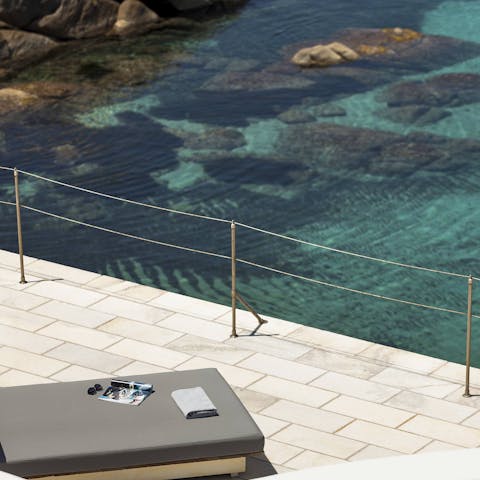 Sunbathe with views over the Aegean