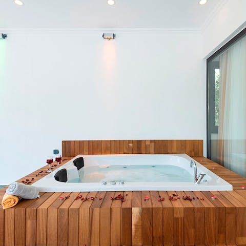 Unwind after a day of exploring the town in the private hot tub