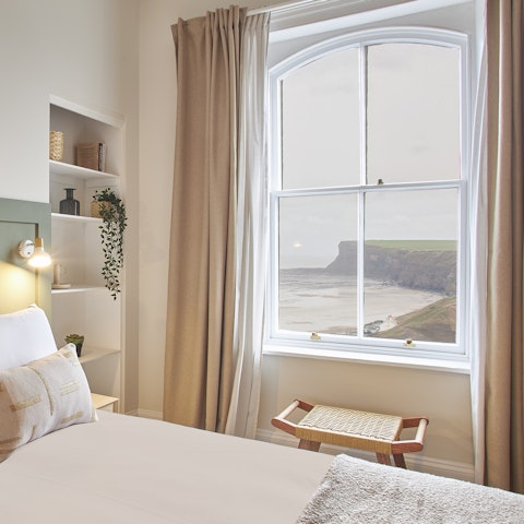 Wake up to stunning coastal views