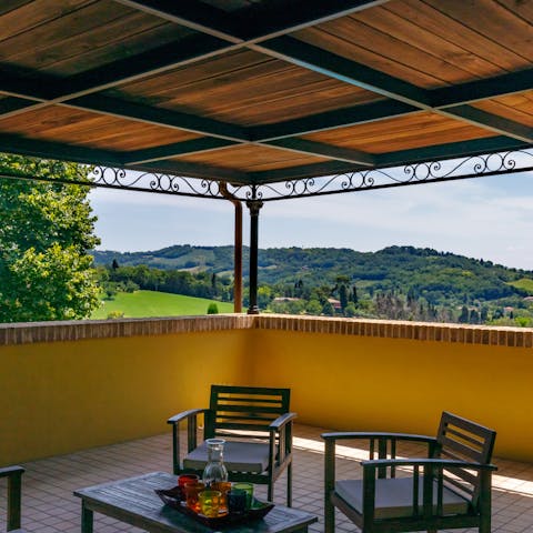 Sip your morning orange juice on the terrace with serene country views