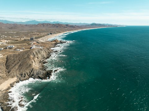 Surf world-class waves at Cerritos Beach, a beloved Baja break, fiteen minutes by car