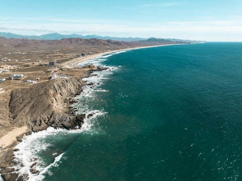 Surf world-class waves at Cerritos Beach, a beloved Baja break, fiteen minutes by car