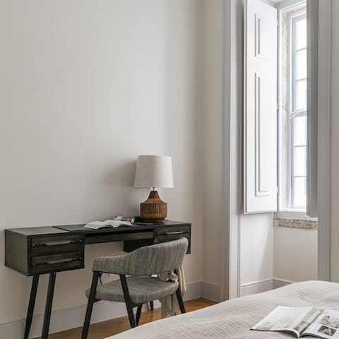 Catch up on work at the master bedroom's desk