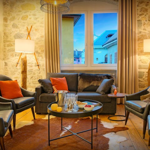 Relax on the comfy sofa after a busy day exploring the lake