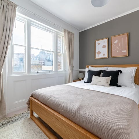 Wake up to city views in the bedroom