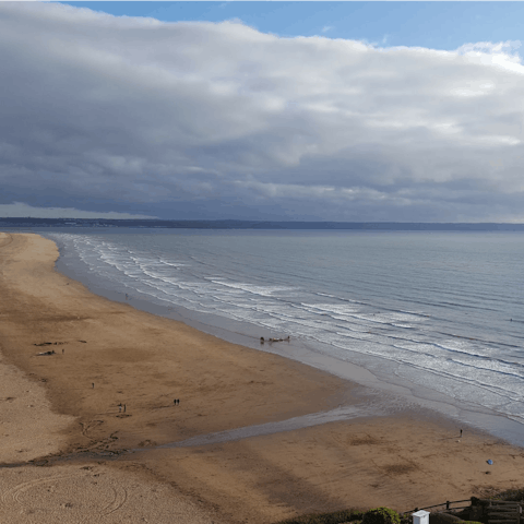 Breathe in the sea air at Saunton Sands beach, a ten-minute walk away