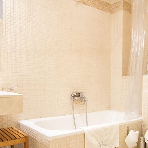 Soak the day away from the comfort of the bathtub