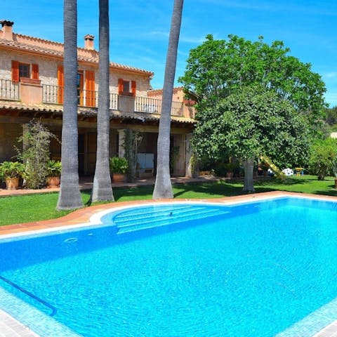 Splash around in the private swimming pool with the little ones