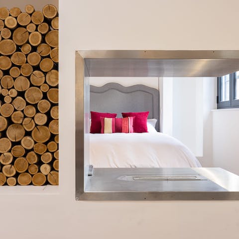 Switch on the stunning electric fireplace feature for a cosy night in