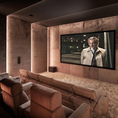 Enjoy memorable movie nights in the plush home cinema