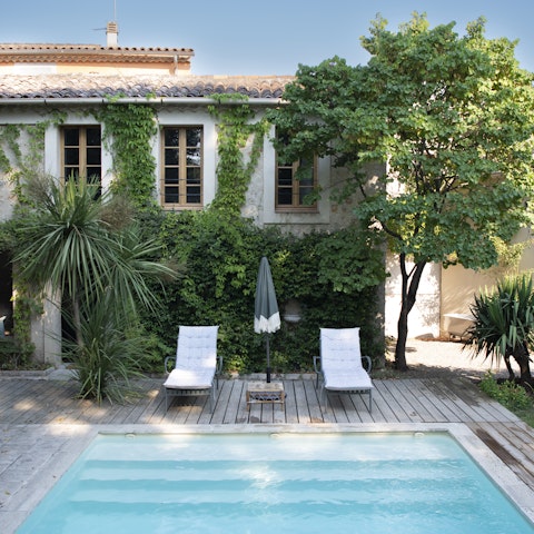 Spend lazy days chilling by the private pool