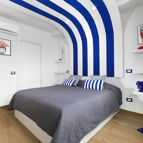 Sink into the comfortable bed after a day of Sorrento sightseeing