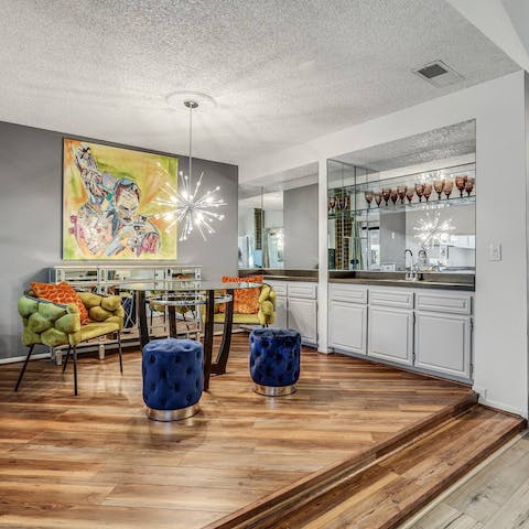 Gather together for a meal in the raised dining room followed by a nightcap from the wet bar