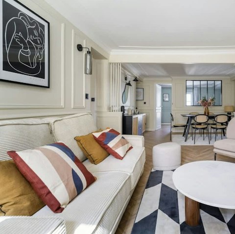 Relax with a guidebook and coffee in the chic living space
