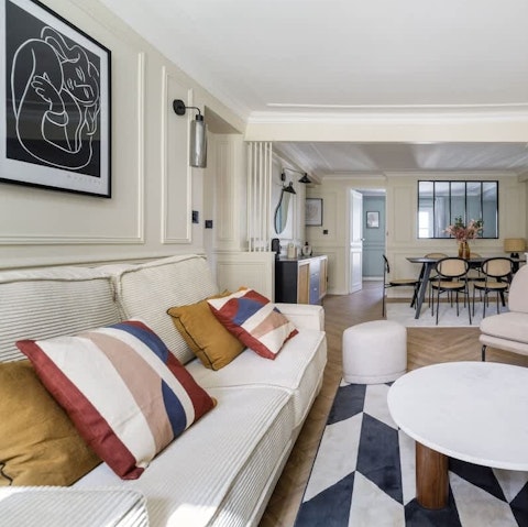 Relax with a guidebook and coffee in the chic living space