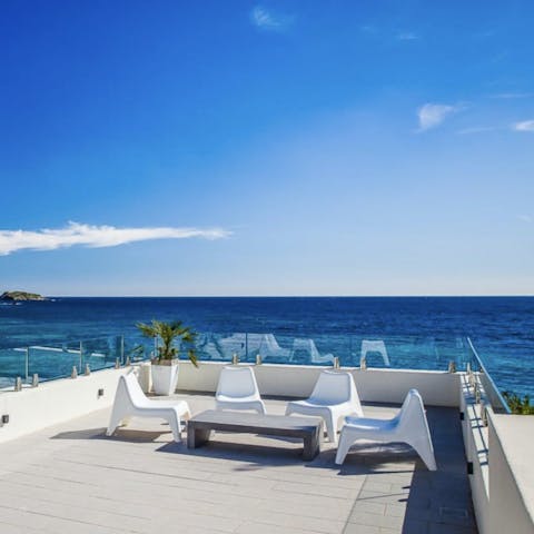 Sip cocktails on the terrace and gaze out to sea