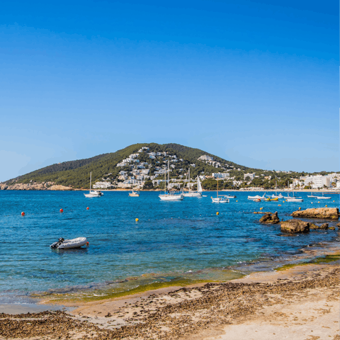 Hop aboard a boat at nearby Santa Eualia marina