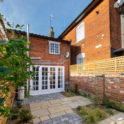 Unwind on the rear terrace after enjoying a romantic day on the coast