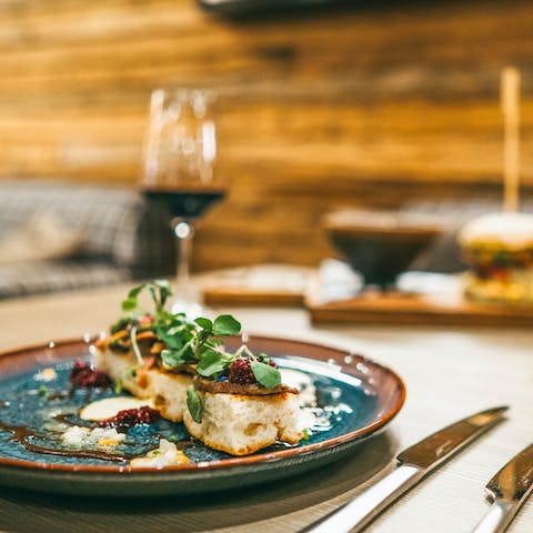 Share a romantic meal in the restaurant