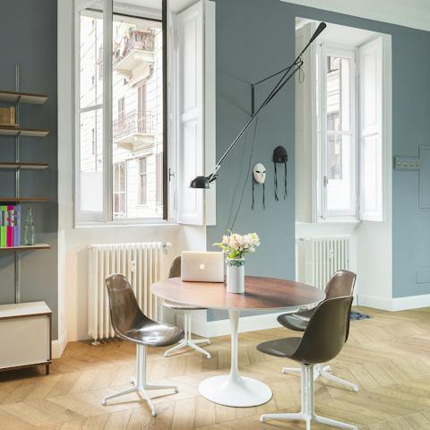 Sit at the table by the large windows – perfect spot to work-from-home, enjoy a meal or people watch