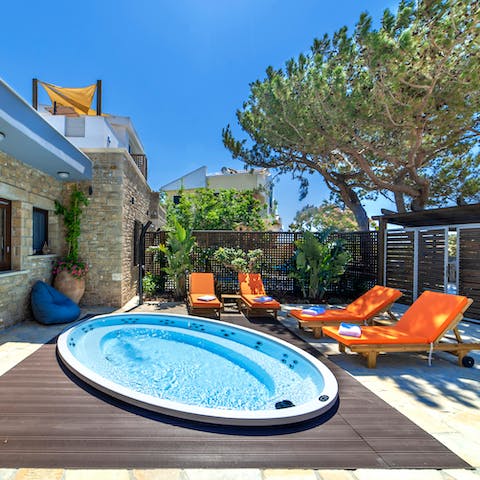 Take a seat in the outdoor spa pool or use the Jacuzzi inside instead