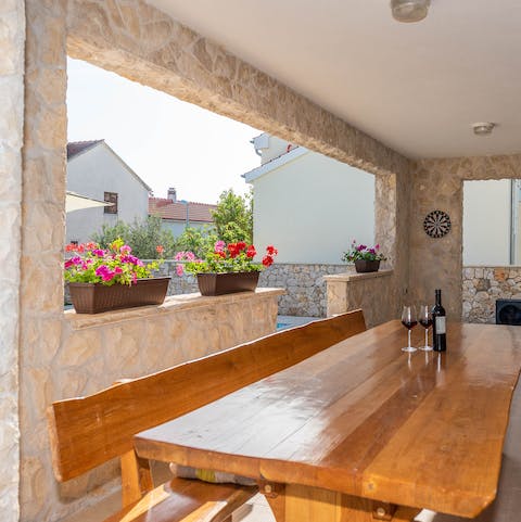 Dine alfresco and take in those Mediterranean views on the shaded dining terrace