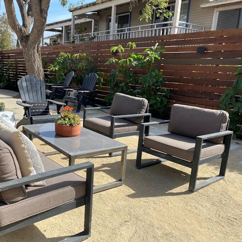 Lounge in the sun at the outdoor patio, shared with the other residents