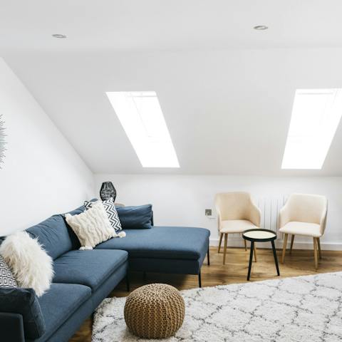 Kick back in the bright and light-filled living space before your next adventure