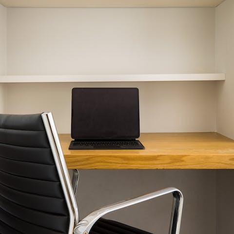 Catch up on emails from the well-equipped workspace